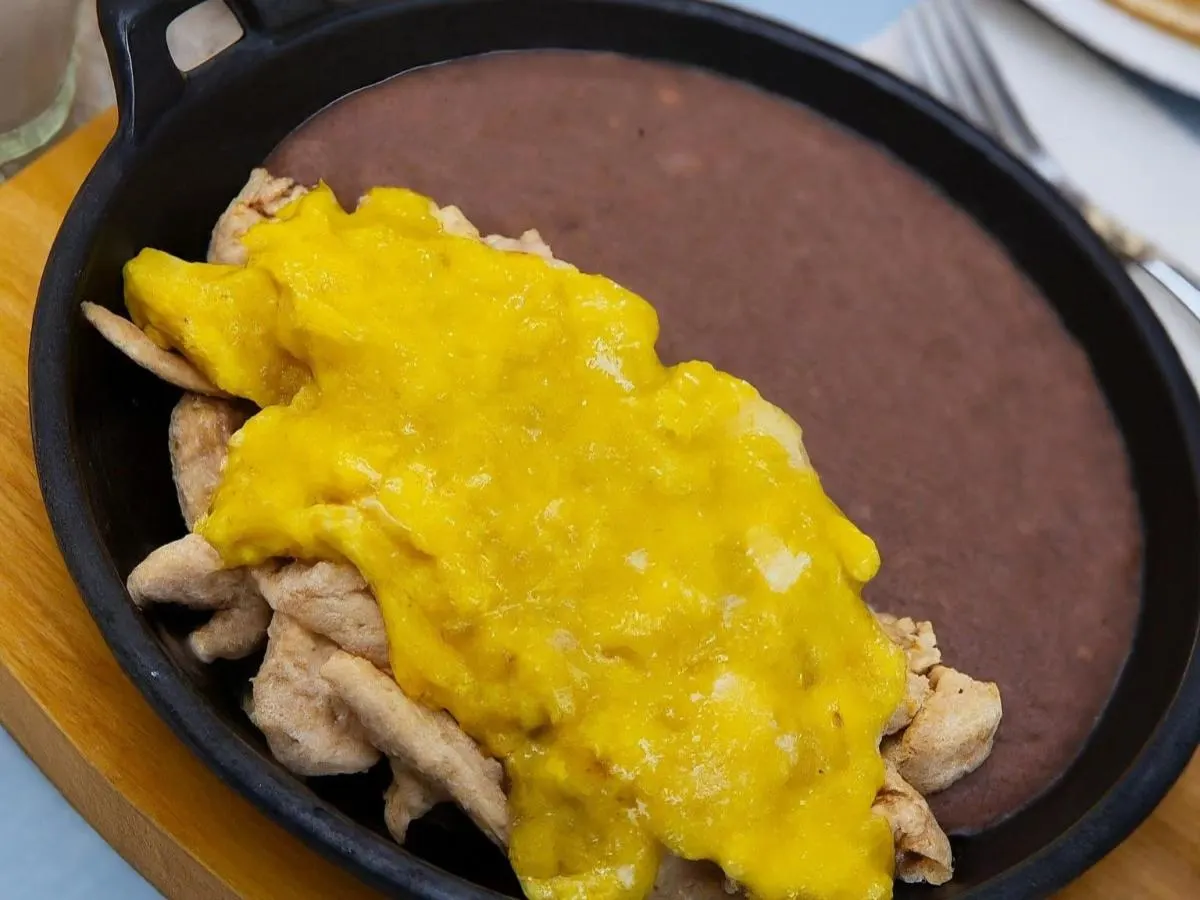 Chilaquiles with Refried Beans Chilaquiles with Refried Beans