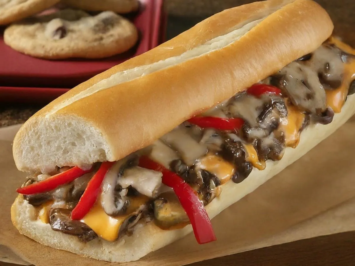 Beef Cheesesteak Sub on White Bread with a Chocolate Chip Cookie Beef Cheesesteak Sub on White Bread with a Chocolate Chip Cookie