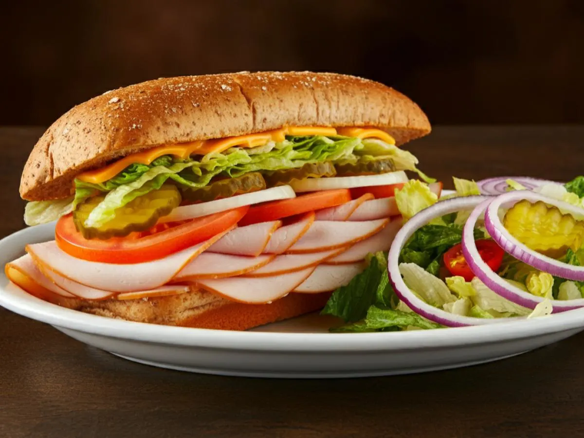 Turkey and Cheddar Sub on Whole Grain Wheat Bread and Side Salad Combo Turkey and Cheddar Sub on Whole Grain Wheat Bread and Side Salad Combo