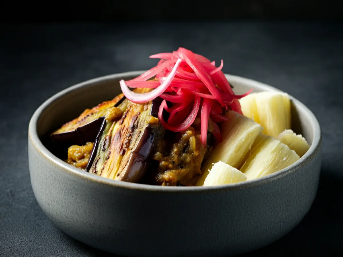 Vegan Roasted Eggplant in Coconut Sauce, Yuca with Pickled Onions & Cabbage