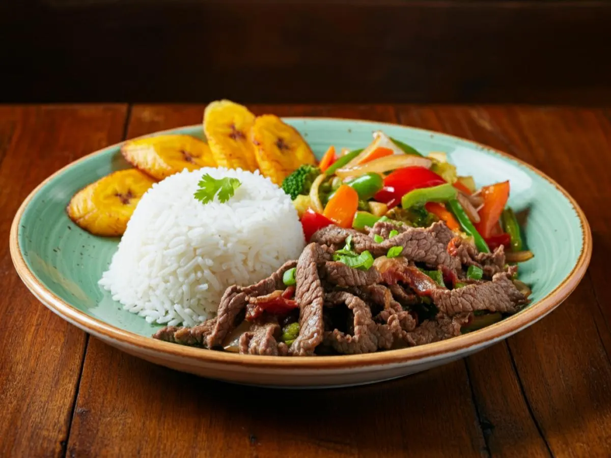 Beef Bistek with Rice, Fried Plantains, and Veggies Beef Bistek with Rice, Fried Plantains, and Veggies