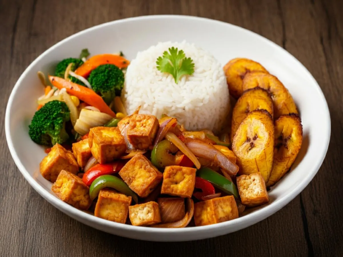Crispy Tofu Sisig with Rice, Fried Plantains, and Veggies Crispy Tofu Sisig with Rice, Fried Plantains, and Veggies