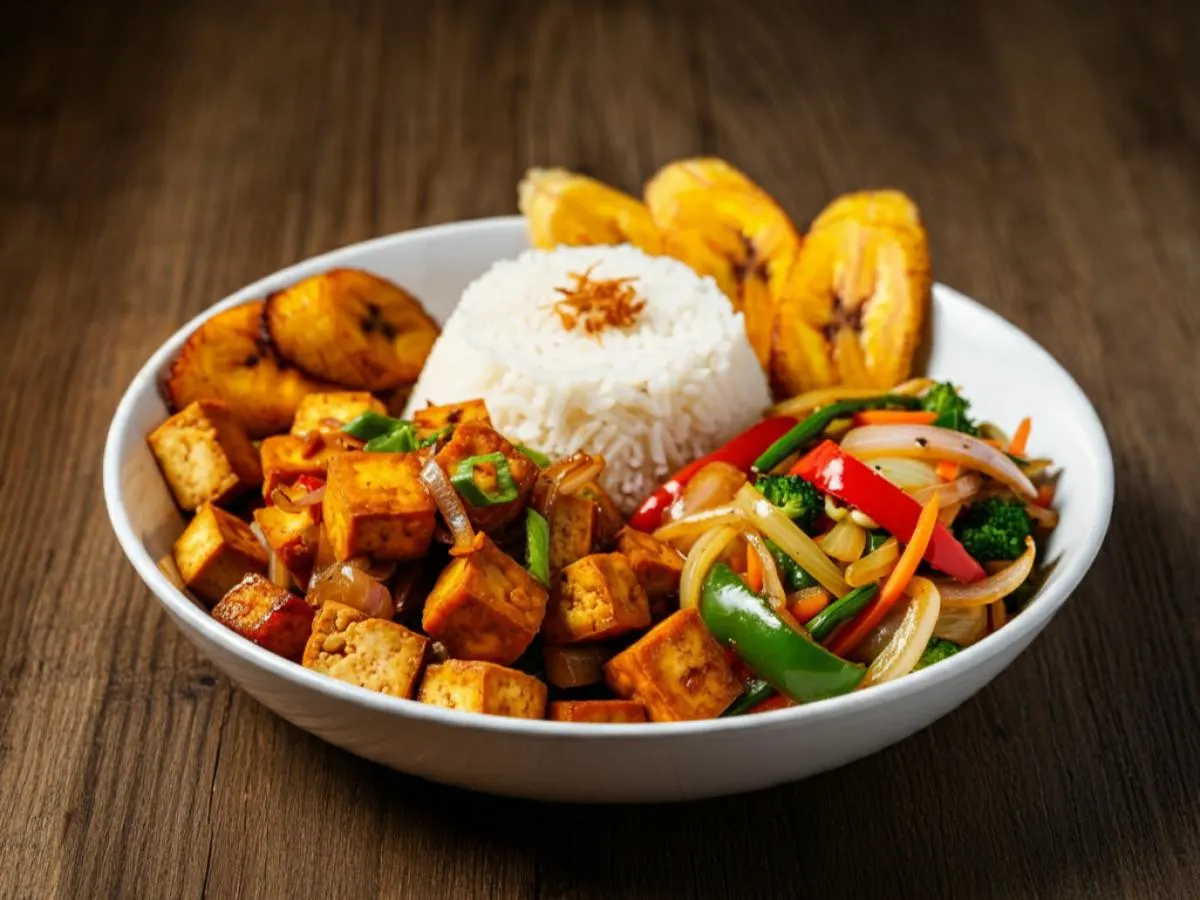 Crispy Tofu Sisig with Garlic Rice, Fried Plantains, and Veggies Crispy Tofu Sisig with Garlic Rice, Fried Plantains, and Veggies