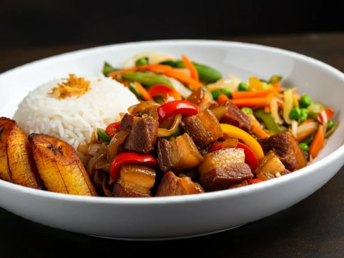 Pork belly sisig with Garlic rice and fried plantains and Veggies Pork belly sisig with Garlic rice and fried plantains and Veggies