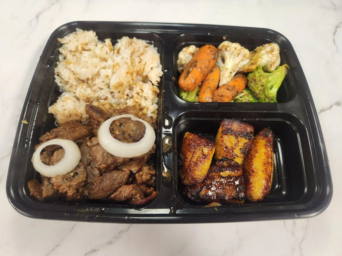 Beef Bistek with Garlic Rice, Fried Plantains, and Veggies Beef Bistek with Garlic Rice, Fried Plantains, and Veggies