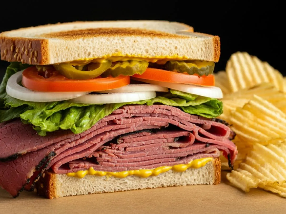 Hot Pastrami Sub on White Bread with Lay's Classic Potato Chips Hot Pastrami Sub on White Bread with Lay's Classic Potato Chips