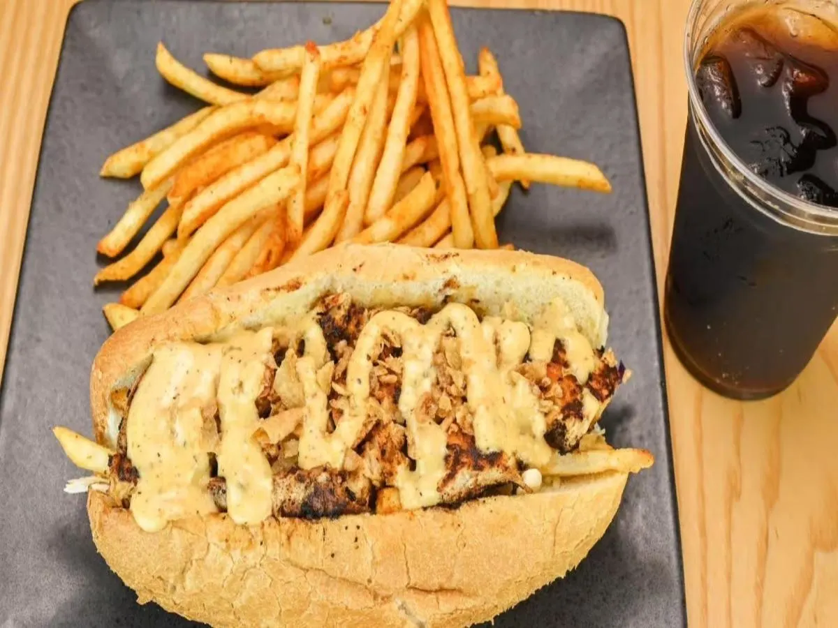Submarine Combo — Mediterranean Chicken Sub, Onion Rings, Coleslaw