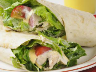 Turkey With Cheddar Wrap With Caesar Salad Turkey With Cheddar Wrap With Caesar Salad
