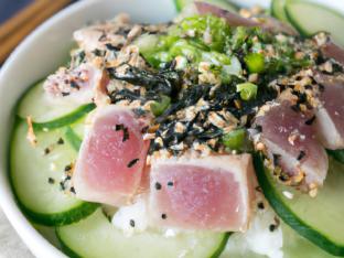 Ahi Tuna, Rice, Cucumber, Edamame, Cilantro, Green Onion, Sesame, Nori, & Garlic Crisps Ahi Tuna, Rice, Cucumber, Edamame, Cilantro, Green Onion, Sesame, Nori, & Garlic Crisps