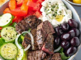 Organic Greens Steak Bowl with Greek Salad & Tzatziki