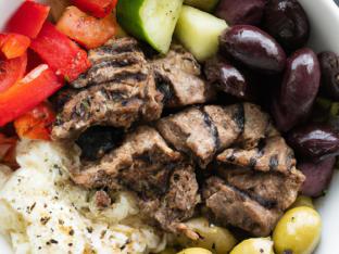 Brown Rice Steak Bowl with Greek Salad & Tzatziki