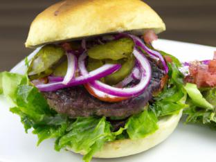 Gluten Free Maverick's Classic Burger With Side Salad and Balsamic Vinaigrette. Gluten Free Maverick's Classic Burger With Side Salad and Balsamic Vinaigrette.
