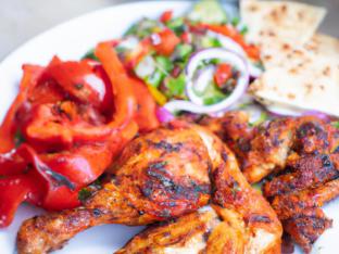 Spicy Harissa Chicken w/ Grilled Veggies and Greek Salad Box