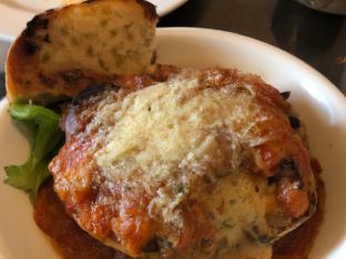Vegan Eggplant Parm with Sautéed Mushrooms and French Bread