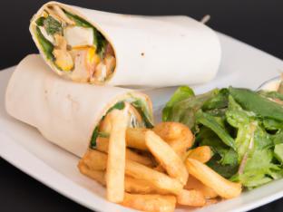 Chicken Caesar Wrap with Chips and a Green Salad Chicken Caesar Wrap with Chips and a Green Salad