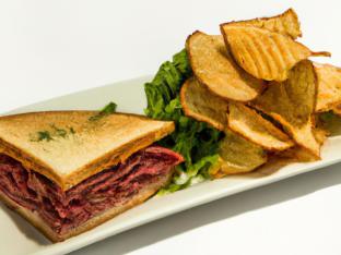 Pastrami Sandwich with Chips and a Green Salad Pastrami Sandwich with Chips and a Green Salad