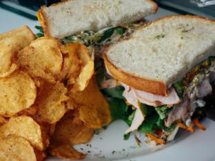 Smoked Turkey Brie Sandwich with Chips and a Green Salad Smoked Turkey Brie Sandwich with Chips and a Green Salad