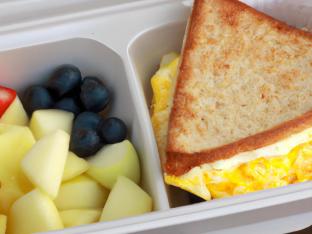 Egg and Cheese on a Roll with Fruit Salad Egg and Cheese on a Roll with Fruit Salad