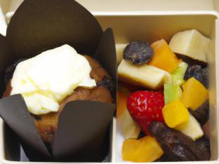 Chocolate Muffin with Butter and Fruit Salad Chocolate Muffin with Butter and Fruit Salad