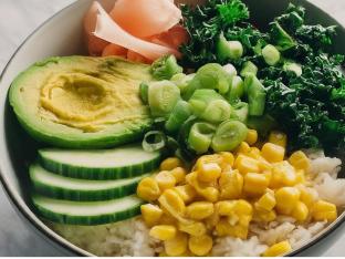 Regular Avocado bowl over Rice with Cucumber, Cabbage, Raw Kale, Sweet Corn, Pickled Ginger, and Green Onion