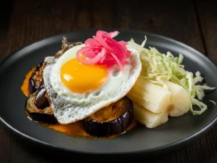 Roasted Eggplant in Coconut Sauce, Egg, Yuca with Egg, Pickled Onions & Cabbage