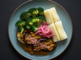 Roasted Eggplant in Coconut Sauce w/Egg, Yuca w/ Pickled Onion, Steamed Broccoli