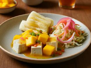 Tropical Mango Tofu with Yuca with Pickled Red Onions and Cabbage