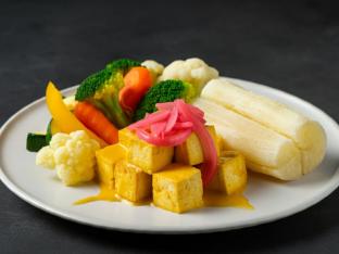 Tropical Mango Tofu with Yuca with Pickled Red Onions & Steamed Vegetables