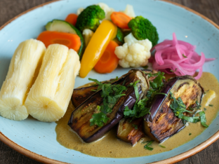 Vegan Eggplant in Coconut Sauce, Yuca w/ Pickled Onions, Steamed Vegetables