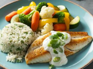 Tilapia with side of Coconut Sauce, Cilantro-Lime Rice & Steamed Vegetables