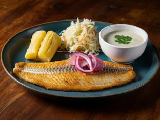 Tilapia with side of Coconut Sauce with Yuca with Pickled Red Onions & Cabbage