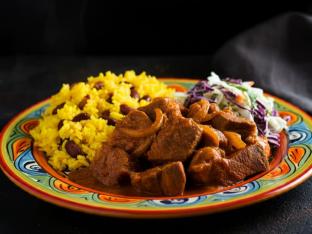 Stewed Pork with Yellow Rice Mixed with Pinto Beans and Cabbage