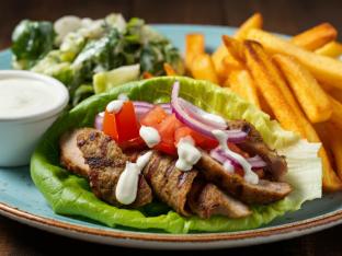 Grilled Pork Gyro on Lettuce Wrap with Tahini Dressing, Greek Fries and DF Salad