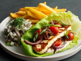 Grilled Halloumi Gyro on Lettuce Wrap with Tahini Dressing, Greek Fries and DF Salad