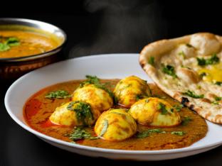 Egg Curry with Dal Tadka and Garlic Naan Egg Curry with Dal Tadka and Garlic Naan