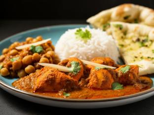 Chicken Tikka Masala with Chana Masala, Basmati Rice, and Garlic Naan Chicken Tikka Masala with Chana Masala, Basmati Rice, and Garlic Naan