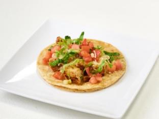 Grilled Chicken Tacos on Corn Tortilla, Mexican Style with Refried Beans Plate Grilled Chicken Tacos on Corn Tortilla, Mexican Style with Refried Beans Plate