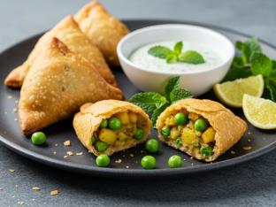 Indian Potato & Green Pea Samosas With Cilantro-mint Dippingsauce Indian Potato & Green Pea Samosas With Cilantro-mint Dippingsauce