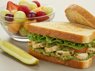 Gluten Free Chicken Pesto Sandwich With Fruit Salad and a Pickle Spear Gluten Free Chicken Pesto Sandwich With Fruit Salad and a Pickle Spear