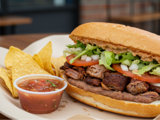 Al Pastor Torta with Refried Beans