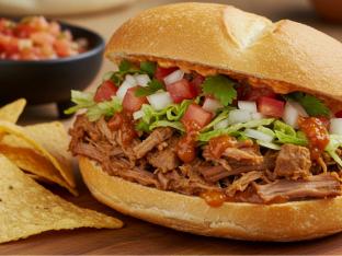 Carne Asada Torta with Refried Beans and Guacamole