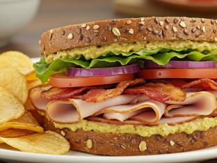 Turkey Club Sandwich with House-Made Chips Turkey Club Sandwich with House-Made Chips