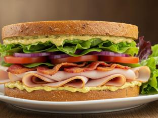 Gluten-Free Turkey Club Sandwich with Mixed Greens Gluten-Free Turkey Club Sandwich with Mixed Greens
