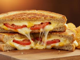 Gluten-Free Grilled Three-Cheese Tomato Sandwich with House-Made Chips Gluten-Free Grilled Three-Cheese Tomato Sandwich with House-Made Chips
