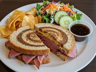 Pastrami Sandwich with Chips and a Green Salad Pastrami Sandwich with Chips and a Green Salad