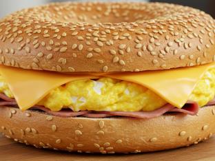 Ham Egg and Cheese Sesame Bagel Sandwich