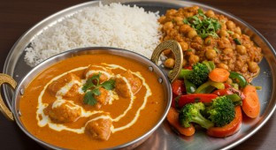 Butter Chicken and Chana Masala with Rice and Vegetables