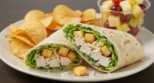 Chicken Caesar Wrap With Chips and Fruit Cup
