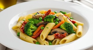 Mezzi Rigatoni Primavera Shitake Mushrooms, Seasonal Vegetables, Sun Dried Tomatoes, Roasted Garlic, Extra Virgin Olive Oil