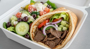 Lamb Shawarma Wrap with Tzatziki Sauce and a Greek Salad